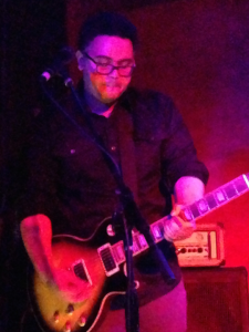 John Samuel, lead guitar, In-Flight Safety